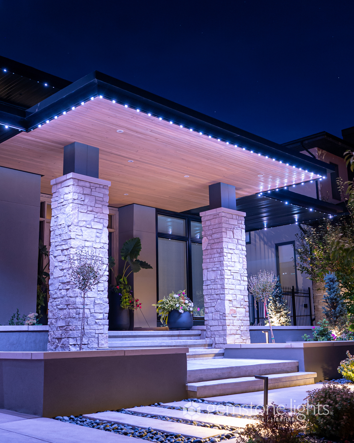 Modern Calgary home with warm white architectural soffit lighting — Calgary Permanent Lights, authorized Gemstone Lights installer Calgary